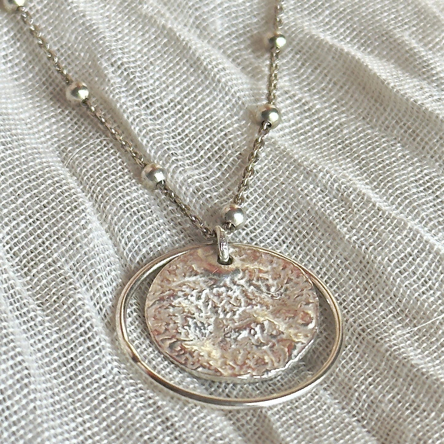 Collier EROS